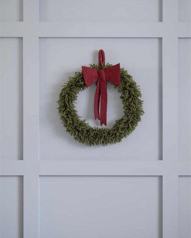 Großer Türkranz aus Wolle mit roter Filzschleife