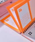 Tischkalender 2027 in Neonorange von FOX&POET