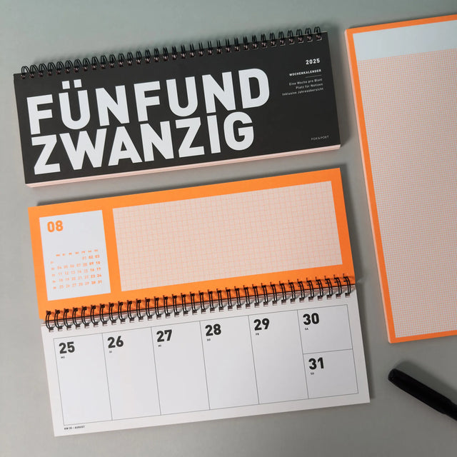 Neonorangener Tischkalender 2025