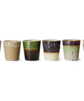 Sechs Kaffeebecher GROUNDING von HKliving nebeneinander, jeder mit einer anderen Glasur